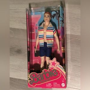 Ken doll dressed as Allan from the Barbie movie swag bag
